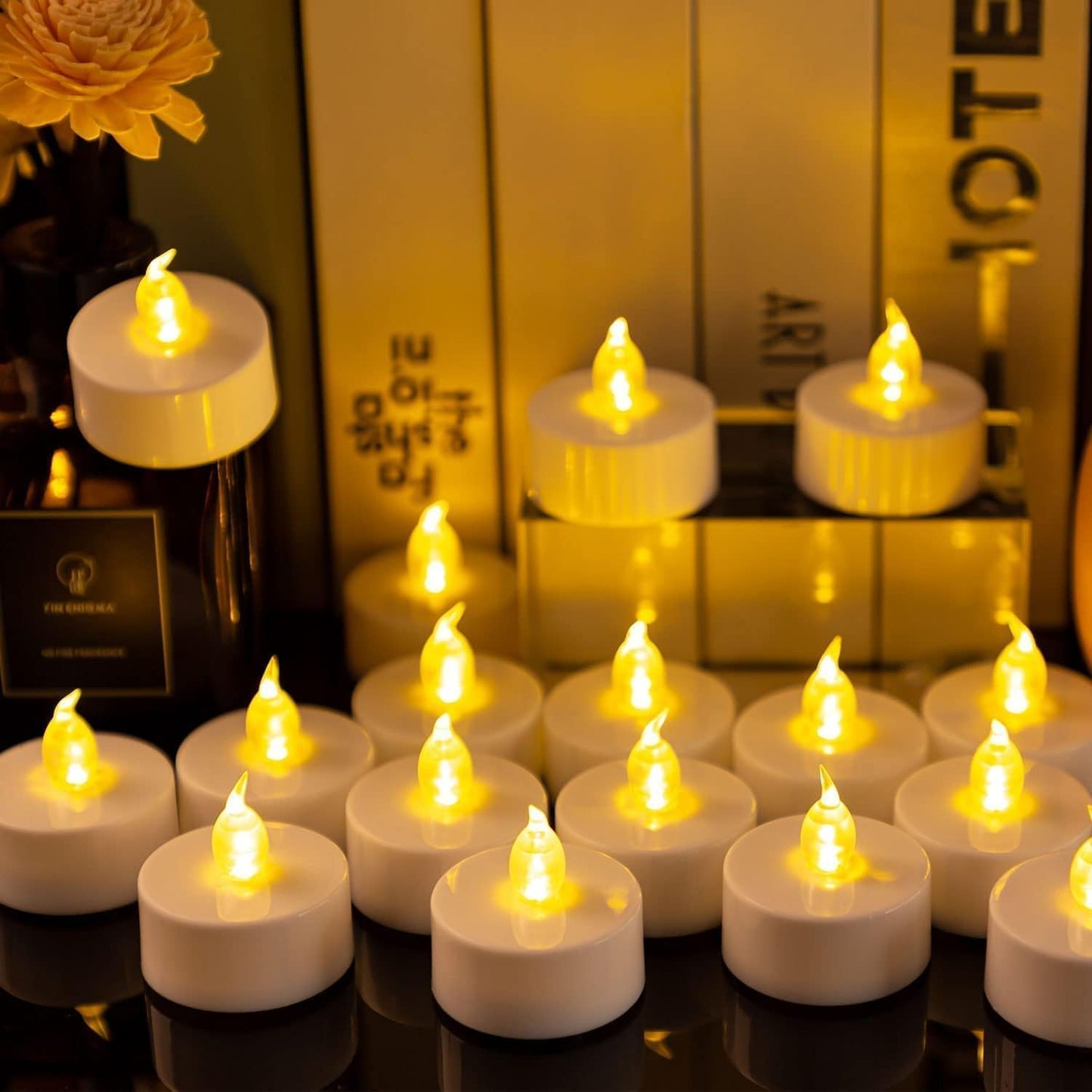 Hanzim Tea Light Candles with Remote Control,Flickering Flameless LED Candle,Long Lasting 400+Hours,Battery Operated with Timer for Home Decoration Seasonal &Festival Celebration WarmYellow (12pcs)
