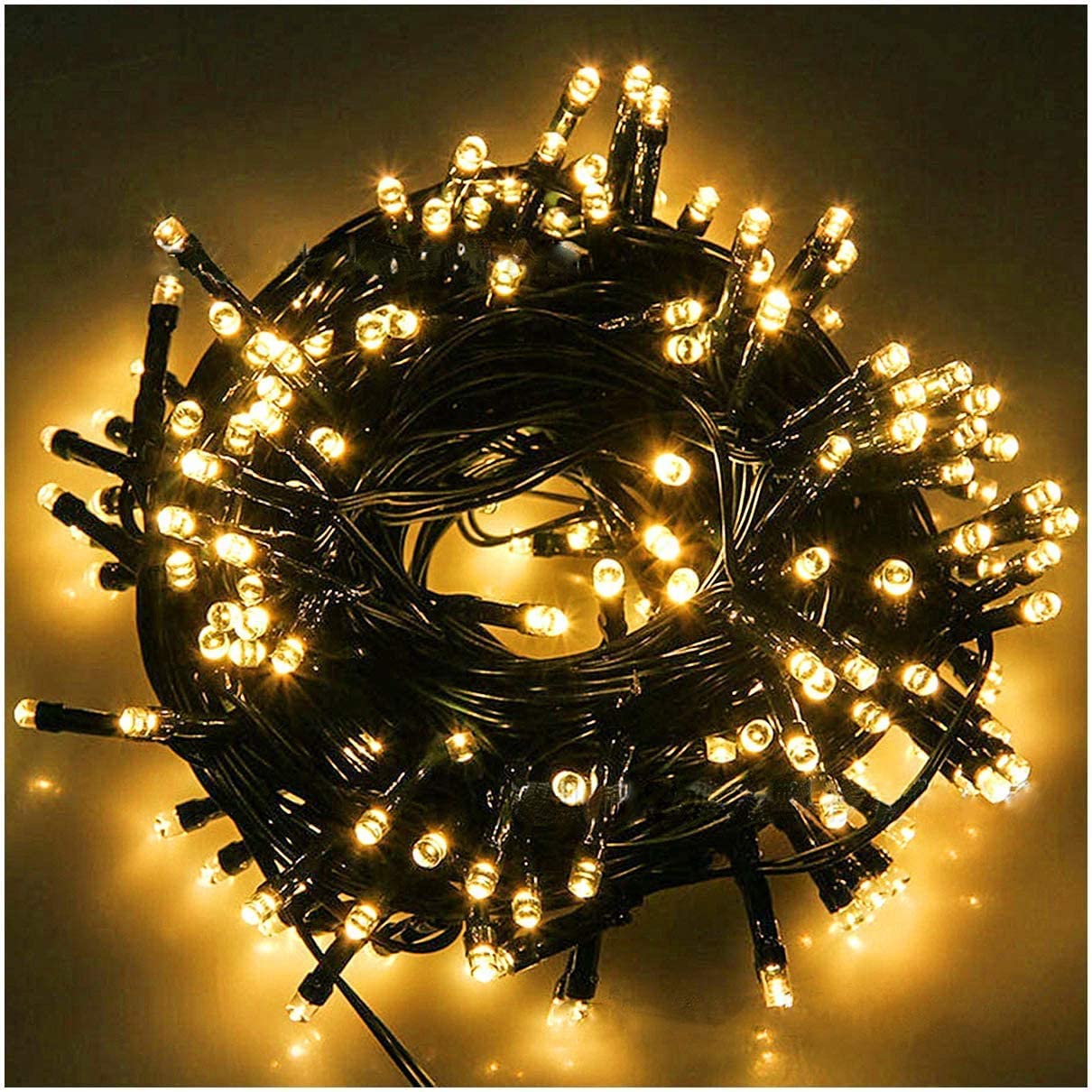 Fairy Black String Lights with Memory Function. Extendable 33ft 100 LED Plug in Cozy Warm White Decorations for Christmas Xmas Tree, Garden, Party, or Home, creating magical indoor outdoor Ambiance