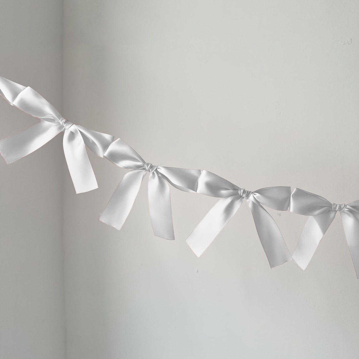 Eanjia Pre-Assembled White Bow Garland - 6ft Elegant Church Wedding Decor, Baby Shower Banner & Bridal Shower Backdrop, Thick Satin No DIY Needed! Baby Room Bed Decor (White, 6ft)