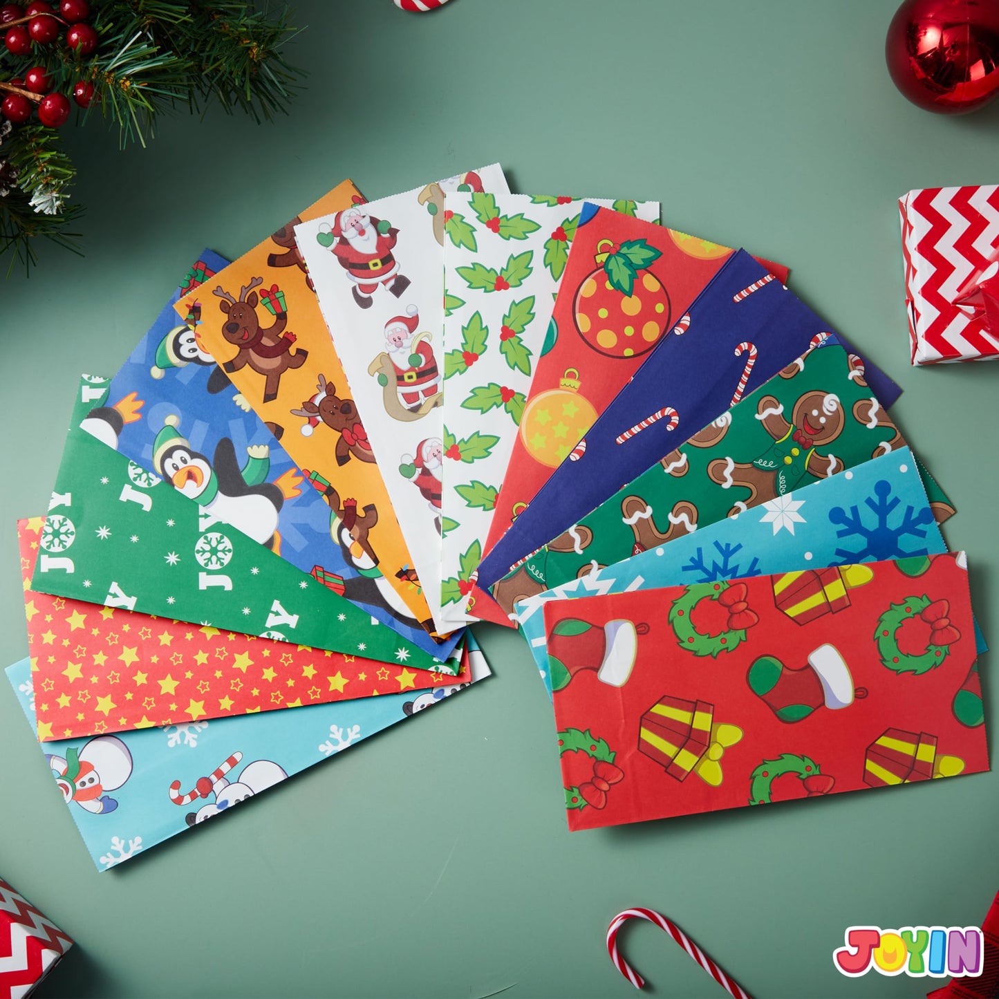 Joiedomi 72 PCS of Christmas Goody Kraft Bags, 12 Assorted Xmas Designs Small Holiday Goodie Gift Bags for Classrooms Party Favors, Christmas Craft Party Treat (9.75" x 3" x 5")