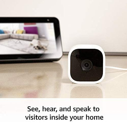 Blink Mini - Compact indoor plug-in smart security camera, 1080p HD video, night vision, motion detection, two-way audio, easy set up, Works with Alexa – 2 cameras (Black)