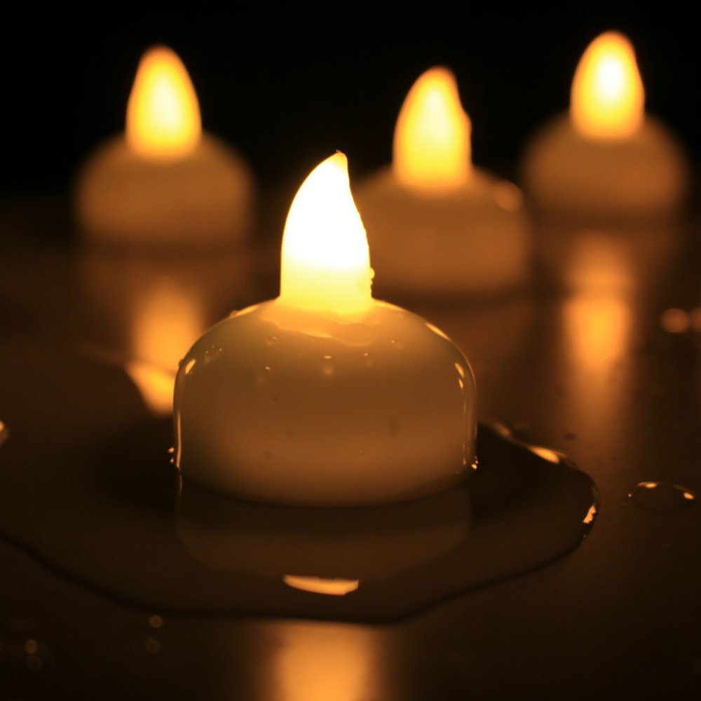 Novelty Place 12Pcs Waterproof Flameless Floating Tealights, LED Floating Candles Warm Yellow Flickering Tea Lights - Battery Operated Candles Decoration for Wedding, Christmas, Party, Pool, Pond