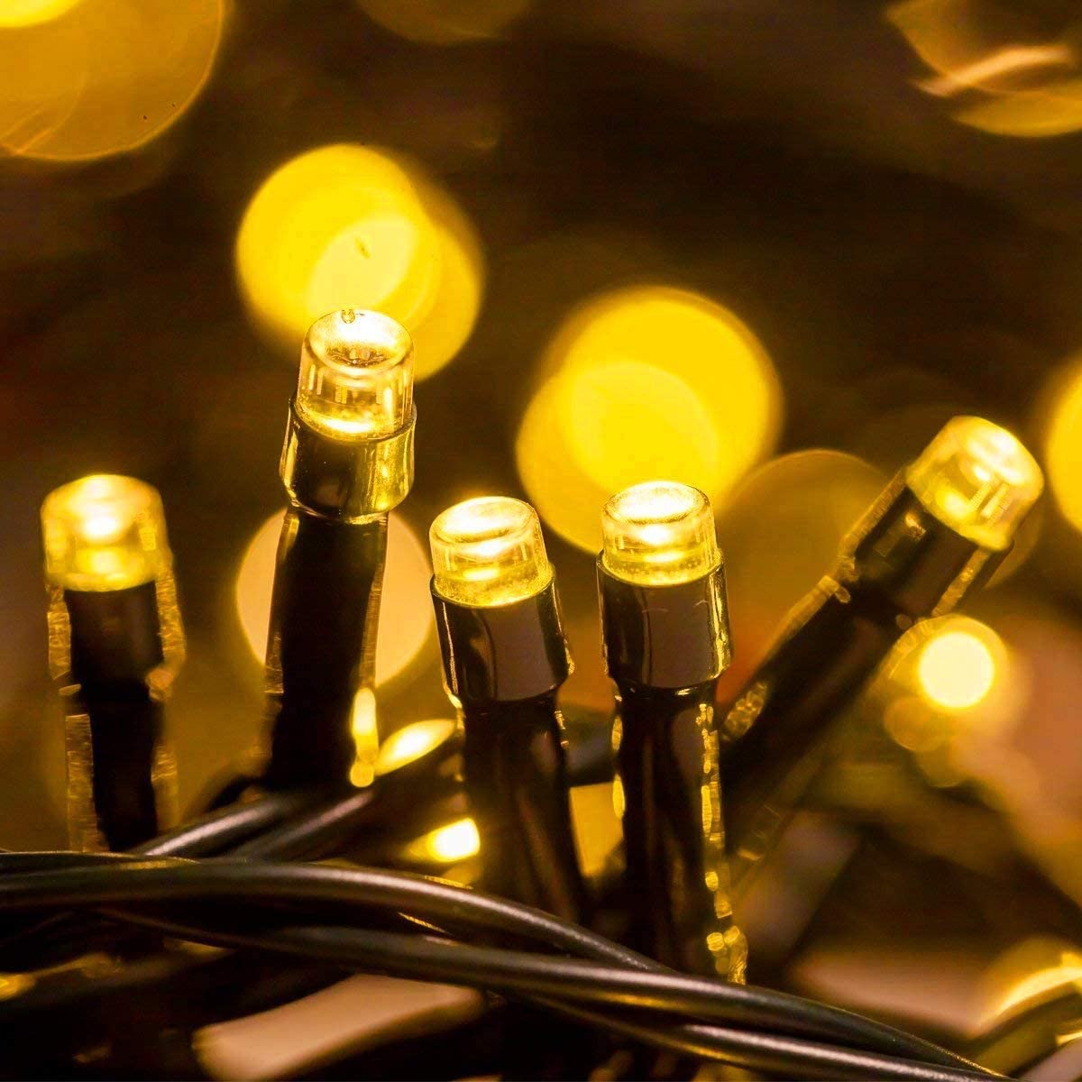 Fairy Black String Lights with Memory Function. Extendable 33ft 100 LED Plug in Cozy Warm White Decorations for Christmas Xmas Tree, Garden, Party, or Home, creating magical indoor outdoor Ambiance