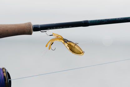 Nomad Design Squidtrex Patented Vibrating Fishing Lure- Scent Added TPE Soft Plastic Lure for Saltwater w/Strong BKK Assist Hooks, Fishing Bait that Catches Many Species- 55mm 2", 1/6oz- Ayu Speckle