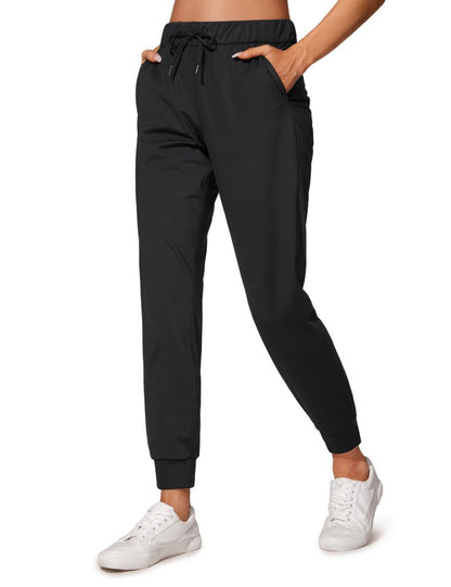 CRZ YOGA 4-Way Stretch Workout Joggers for Women 28" Casual Travel Lounge Athletic Pants with Pockets Black Medium