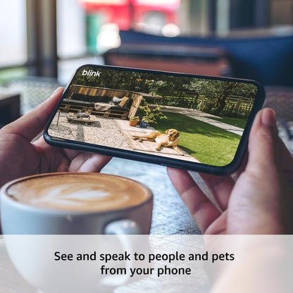 Blink Outdoor 4 + 1-Year Plus plan – Wireless smart security camera, two-year battery life, 1080p HD day and infrared night live view. Sync Module Core included – 2 camera system