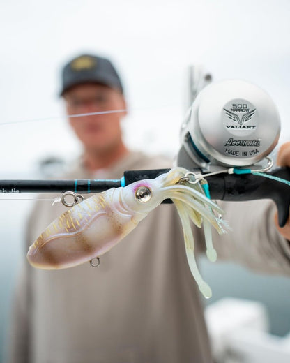 Nomad Design Squidtrex Patented Vibrating Fishing Lure- Scent Added TPE Soft Plastic Lure for Saltwater w/Strong BKK Assist Hooks, Fishing Bait that Catches Many Species, 130mm 5" 3 1/4oz- White Glow