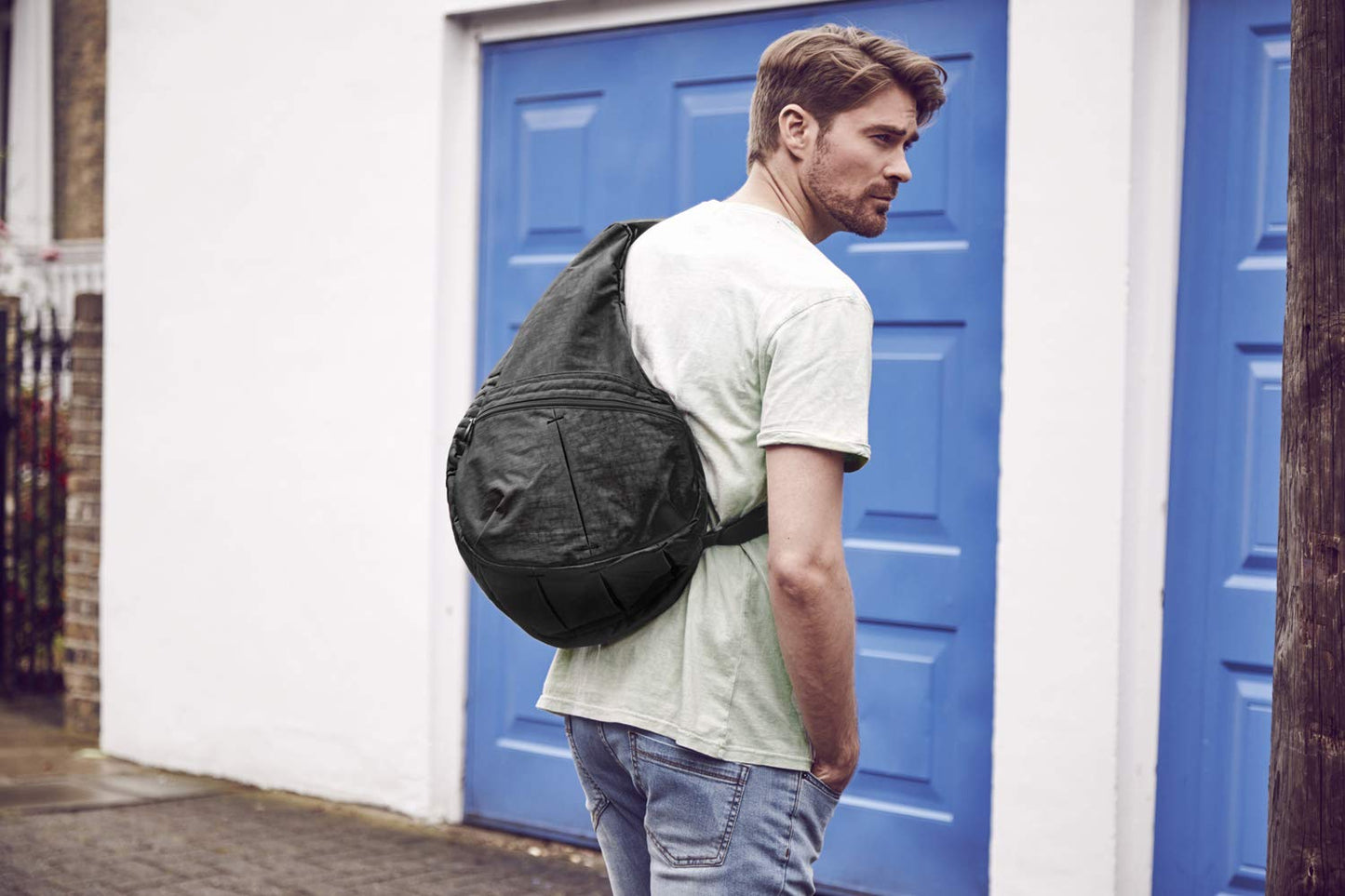 AmeriBag 21" Carry All Healthy Back Bag Ergonomic Crossbody Sling for Everyday Use, Travel & Walking Comfort (Black)