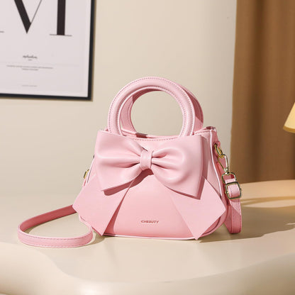 Small Purses for Women Crossbody Bag, Vegan Leather Crossbody Purses and Handbags with Top Carry Handle and Cute Bow Knot(Pink)