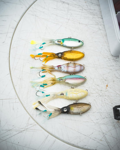 Nomad Design Squidtrex Patented Vibrating Fishing Lure- Scent Added TPE Soft Plastic Lure for Saltwater w/Strong BKK Assist Hooks, Fishing Bait that Catches Many Species- 55mm 2", 1/6oz- Ayu Speckle