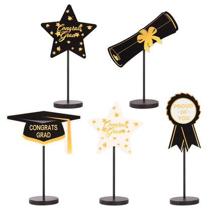 2026 Graduation Decorations, 5Pcs Black Gold White Wooden Table Centerpieces Decor Include Grad Cap Diploma Star Supplies Medal Sign, of Congrats Graduation Day Class Party Decoration.
