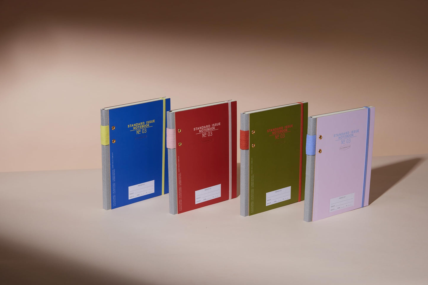 DesignWorks Ink Standard Issue Notebook No. 3, Undated Daily Planner & Writing Journal, 192 Lined Pages, Pen Holder, Small Notebook for Work & Journaling, 6.75 x 8.5 in, Cobalt & Citron