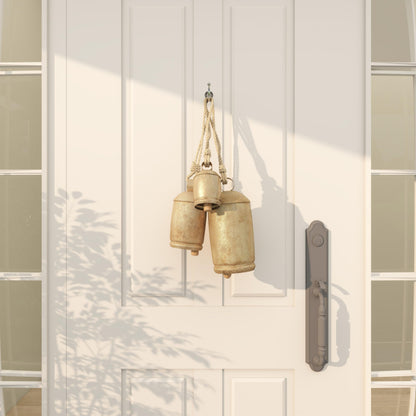 Deco 79 Metal Tibetan Inspired Decorative Cow Bells with Jute Hanging Rope, Set of 3 10", 7", 5"H, Gold