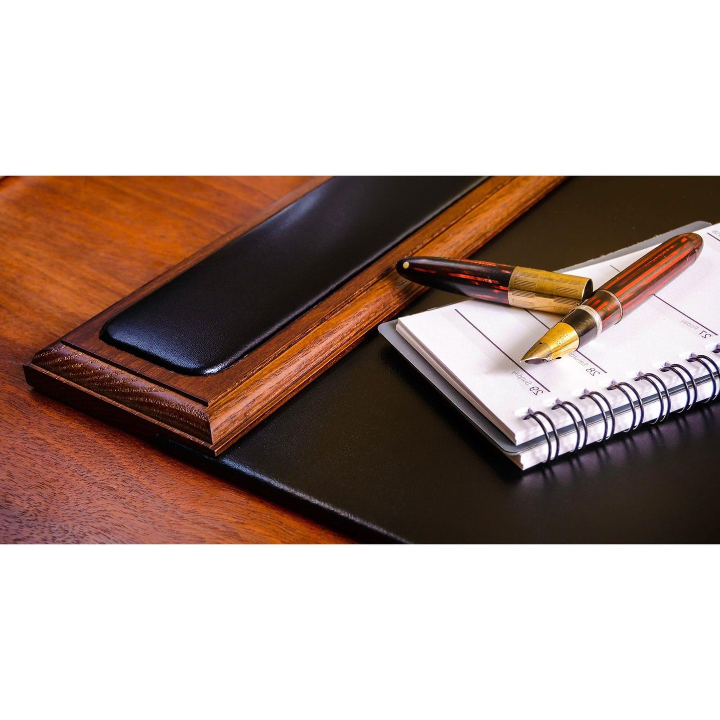 DACASSO Wood & Leather Desk Pad with Side Rails - Luxury Leather Desk Blotter for Writing - Padded Executive Desk Surface Protector - (Walnut & Black, 34” x 20”)