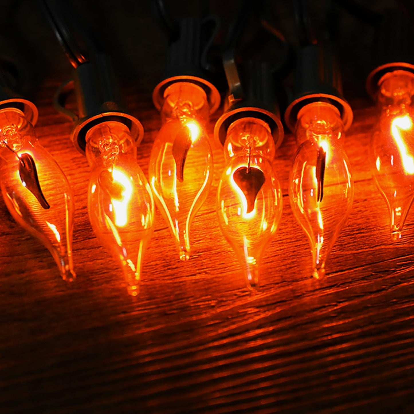 Glowzy 12.8Ft Christmas Lights Flickering Flame String Lights with 12 Pack Clear C7 Flame Light Bulbs（2 Spare）, Great for Indoor Outdoor Home Patio Party Christmas Decorations Lights, 1W, E12 Base