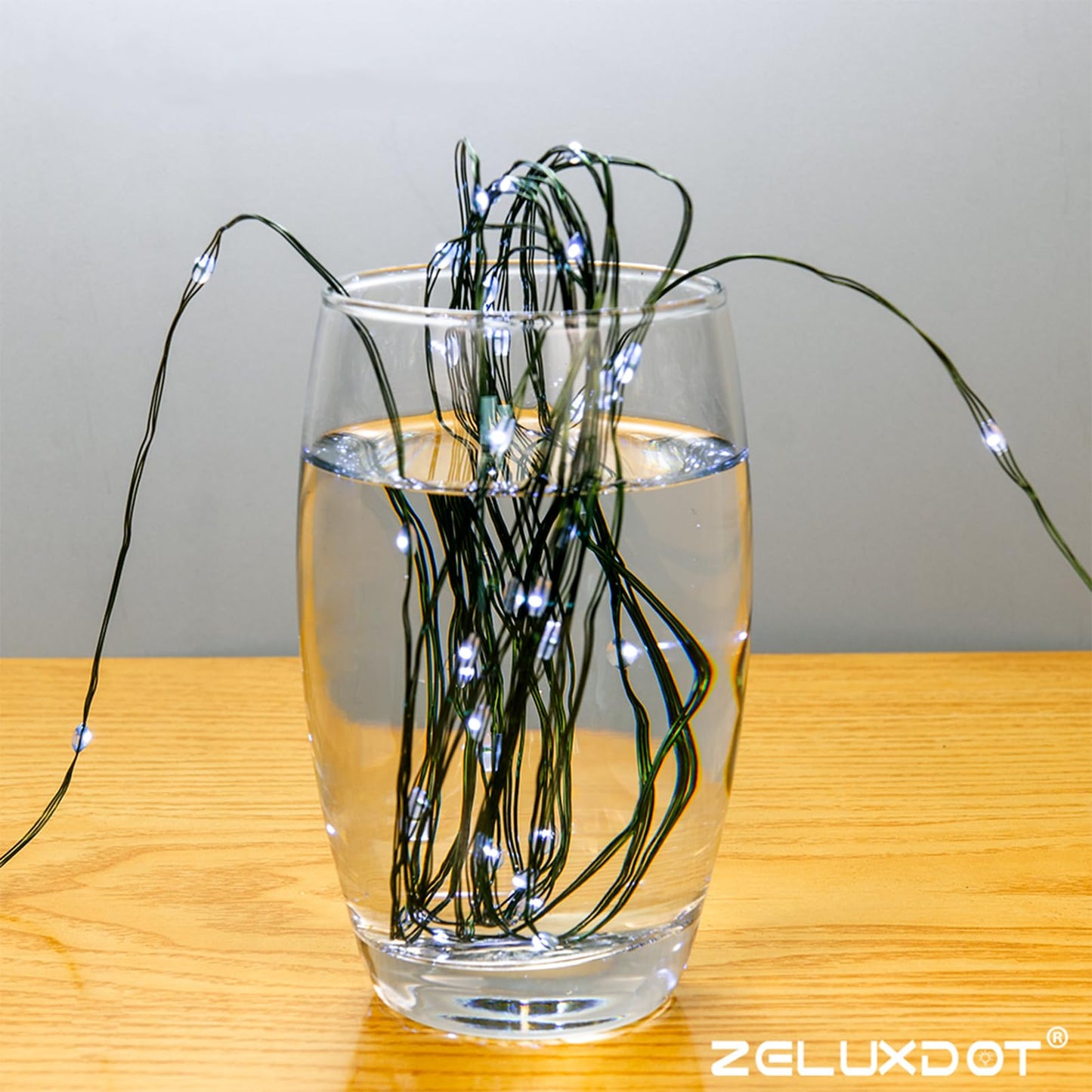 ZELUXDOT Fairy Lights Plug in,200FT 600LEDs Waterproof Led String Lights,8 Modes Remote Twinkle Light for Outdoor Indoor Christmas Wedding Birthday Garden Party Decorations,Green Wire,Cool White