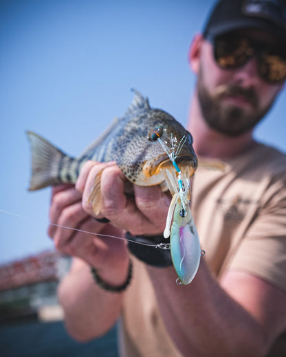 Nomad Design Squidtrex Patented Vibrating Fishing Lure- Scent Added TPE Soft Plastic Lure for Saltwater w/Strong BKK Assist Hooks, Fishing Bait that Catches Many Species- 55mm 2", 1/6oz- Ayu Speckle