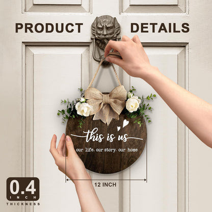This is Us" Welcome Sign, Farmhouse Round Wood Hanging Door Decor with Ribbon Bow and Artificial Greenery, Rustic Front Porch Wreath for Thanksgiving, Christmas, Brown Home Entry Decor