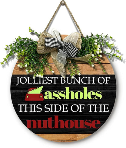 Christmas Door Sign Jolliest Bunch of A-holes Door Sign Funny This Side of The Nuthouse Round Wooden Sign with Bow Wreath Merry Christmas vacation Theme Door Hanging signs for Front Door