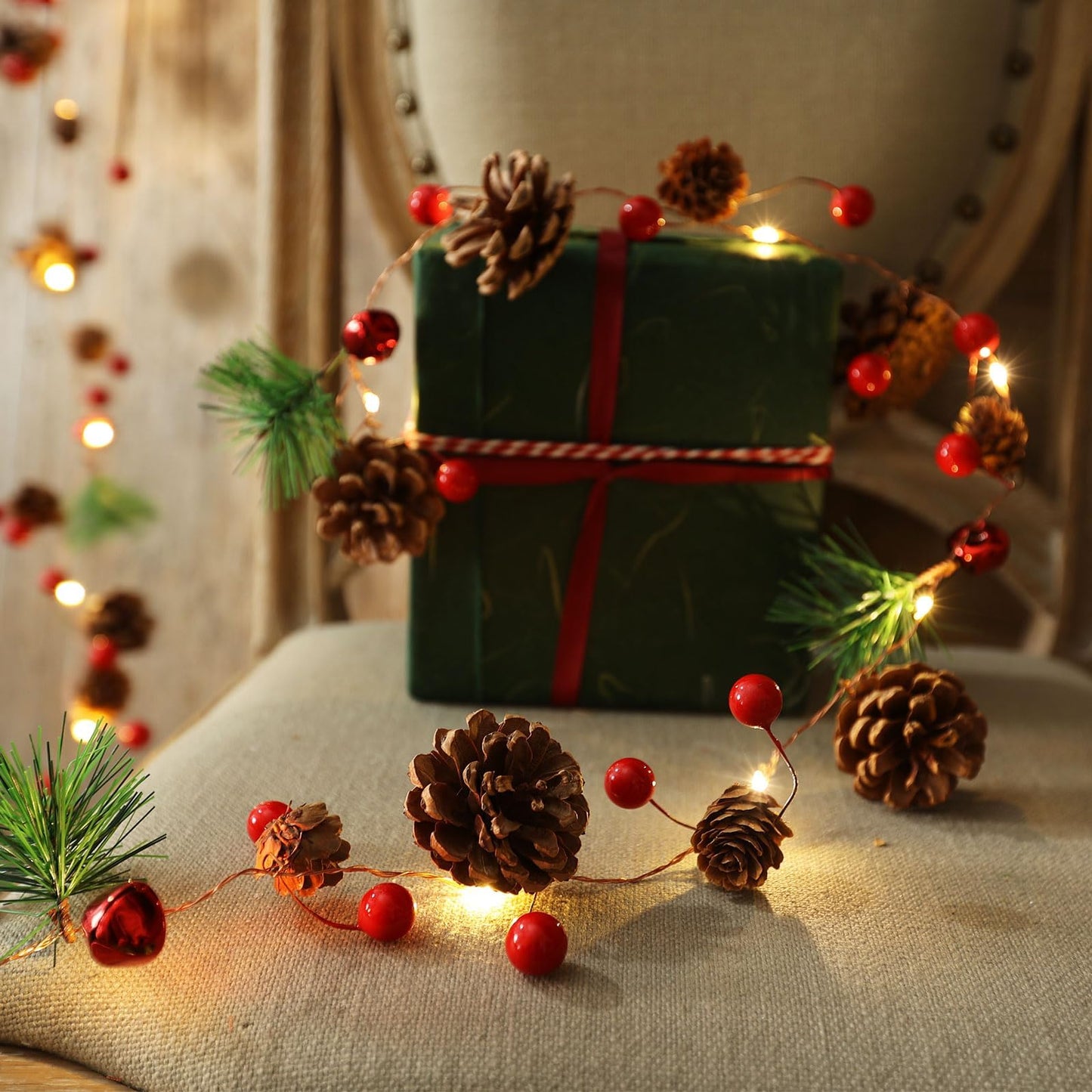 Christmas Garland with Lights, 6.6FT Pinecones Christmas String Lights with Red Berries, Bells & Needles, 20 LED Battery Operated Prelit Garland for Christmas Decorations Indoor/Outdoor (Warm White)