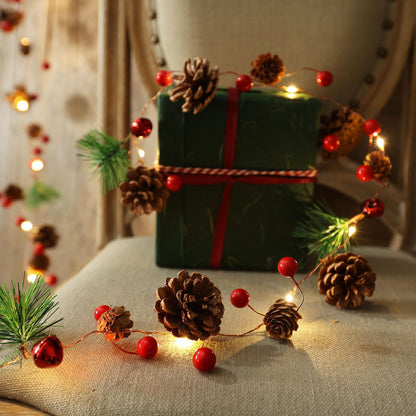 Christmas Garland with Lights, 6.6FT Pinecones Christmas String Lights with Red Berries, Bells & Needles, 20 LED Battery Operated Prelit Garland for Christmas Decorations Indoor/Outdoor (Warm White)
