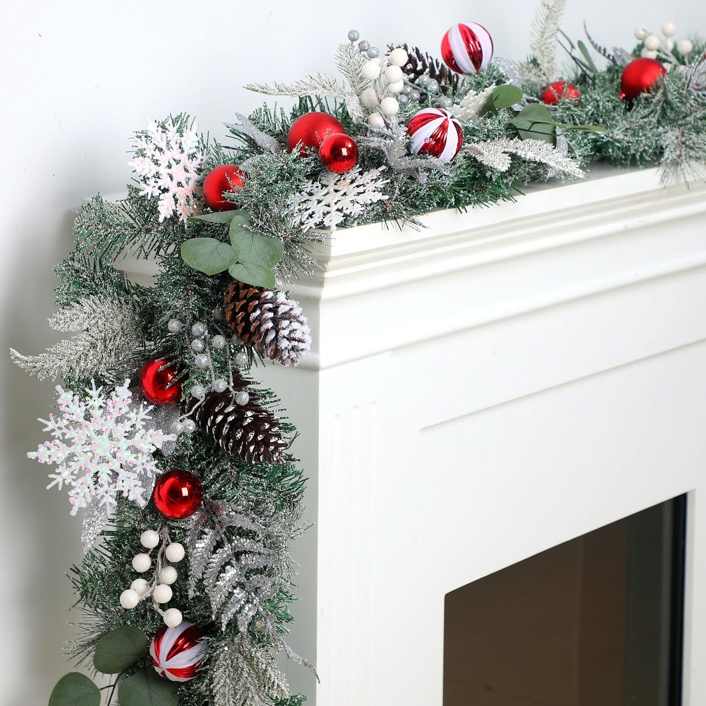 Solsew 6 Feet Snow Flocked Christmas Garland for Mantle White Garland with Silver White Balls Snowflake Pine Cones for Fireplace Table Centerpiece Front Door Staircase Decoration(Silver,Green,Red)