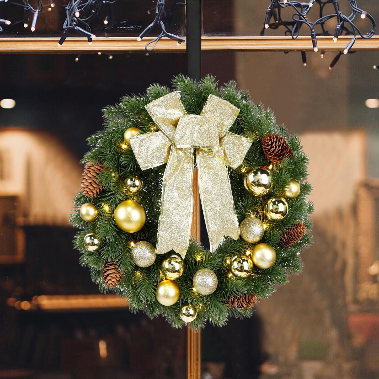 Hausse Lighted Christmas Wreath with Metal Hanger, Pre-lit Xmas Wreath with Large Golden Bow & Balls, Battery Operated with 40 LEDs Lights, for Front Door Gate Wall Christmas Party Decorations