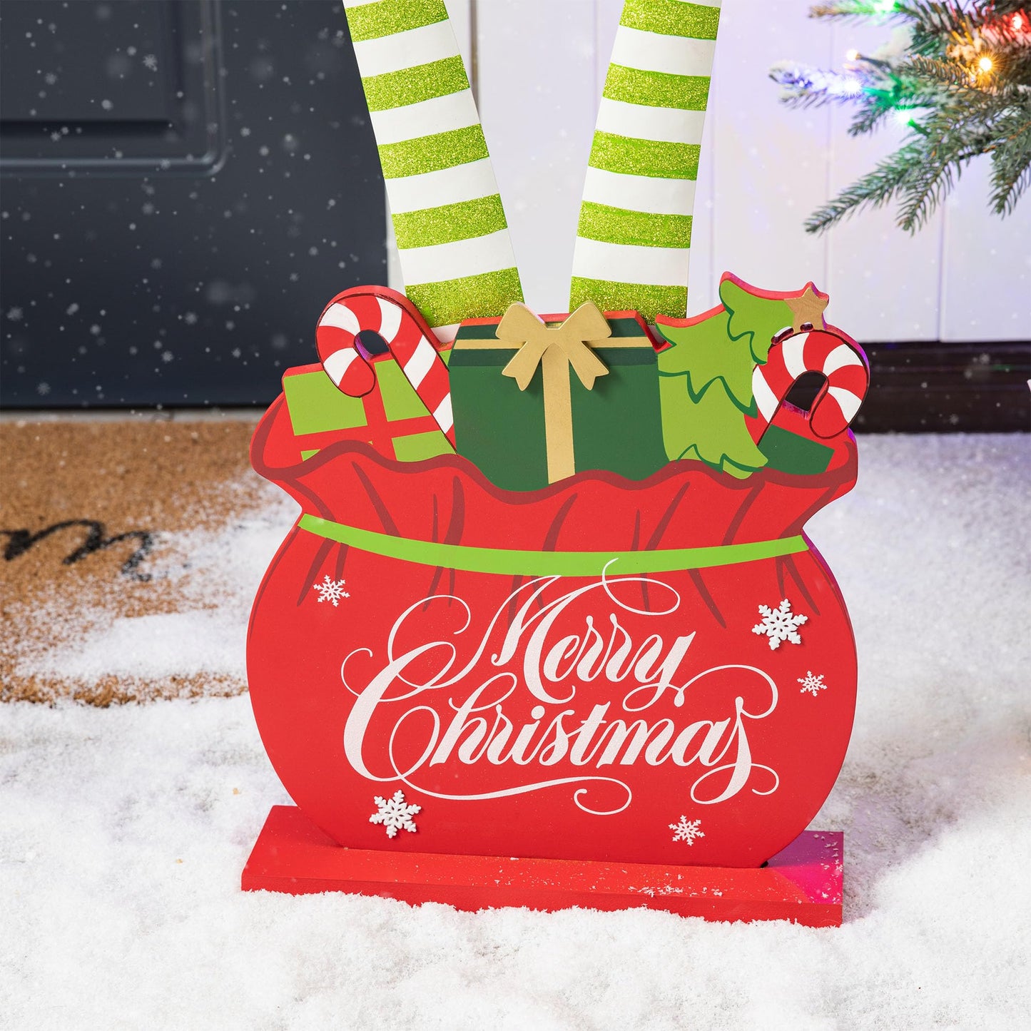 Glitzhome "Merry Christmas" Elf Legs Porch Sign, 24.5" Wood & Metal Gift Bag Display for Holiday, Festive Indoor Outdoor Welcome Greeting Decoration