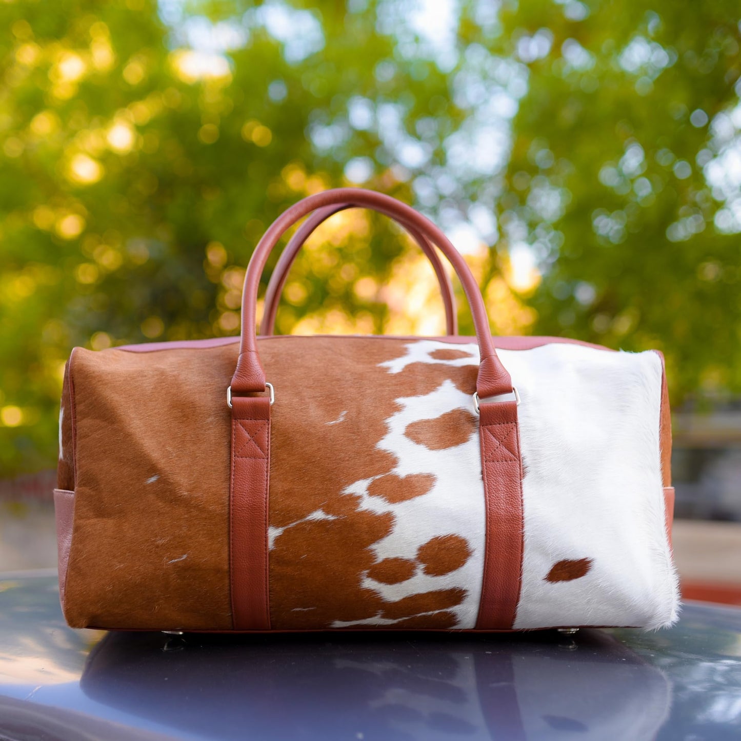 CHAYELL Cowhide Duffle Bag for Men & Women 21” - Unique Full Grain Hair-on Genuine Leather - Authentic Cow Duffle Bag with Strap Overnight Western Weekender Bag - Flight-Ready Carry-On Cow Hide Bag