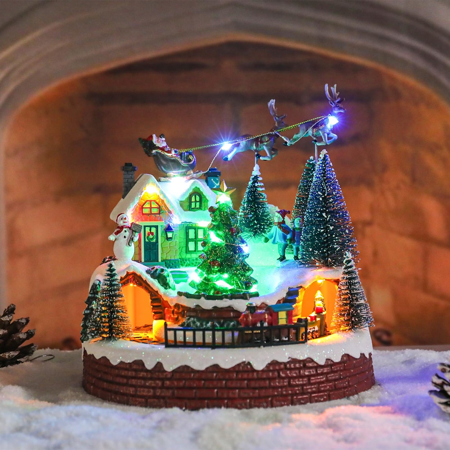 Vipush Christmas Village House Decorations Resin Train Set with Flying Santa Home Decor Indoor Building Figurines Revolving Train with LED Light and 8 Christmas Music for Kids