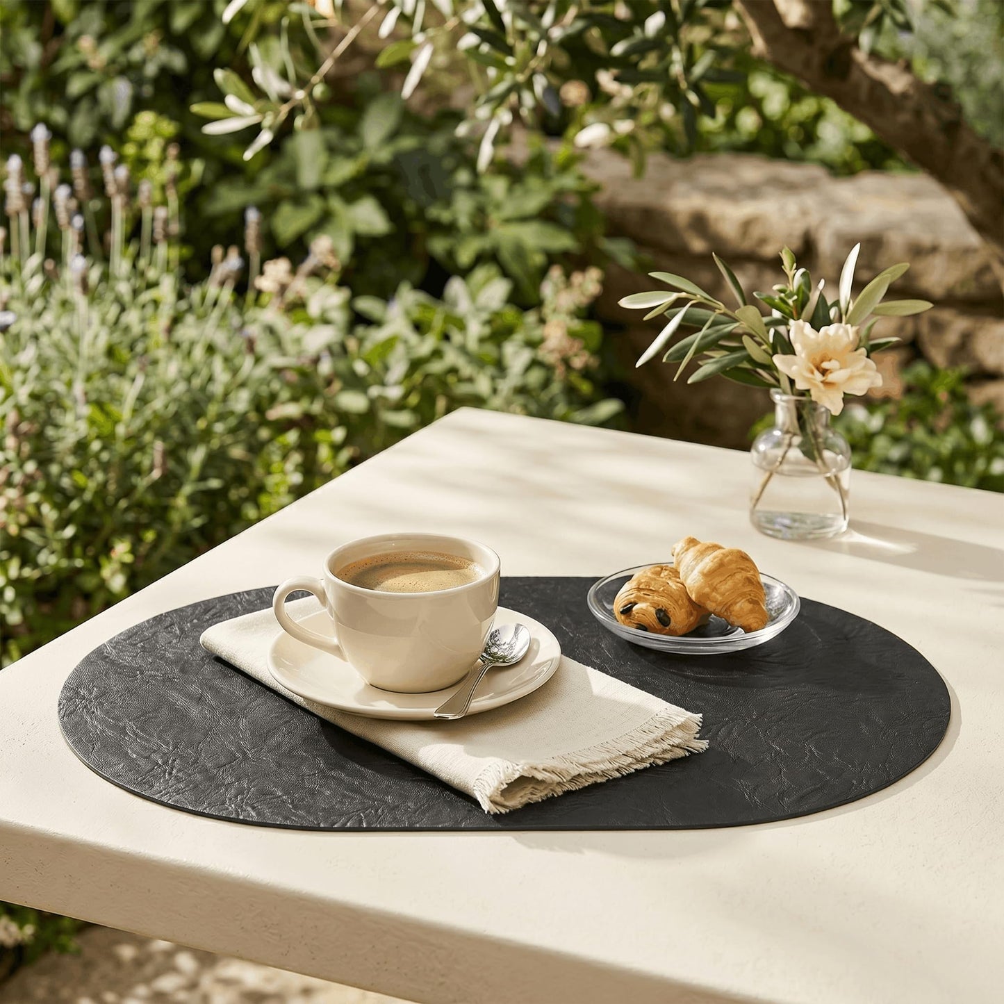 Artoid Mode Black Faux Leather Oval Placemats Set of 6, 12 x 18 Inch Waterproof Wipeable Heat Resistant Vinyl Place Mats, Reversible Table Mats for Kitchen Dining Decor