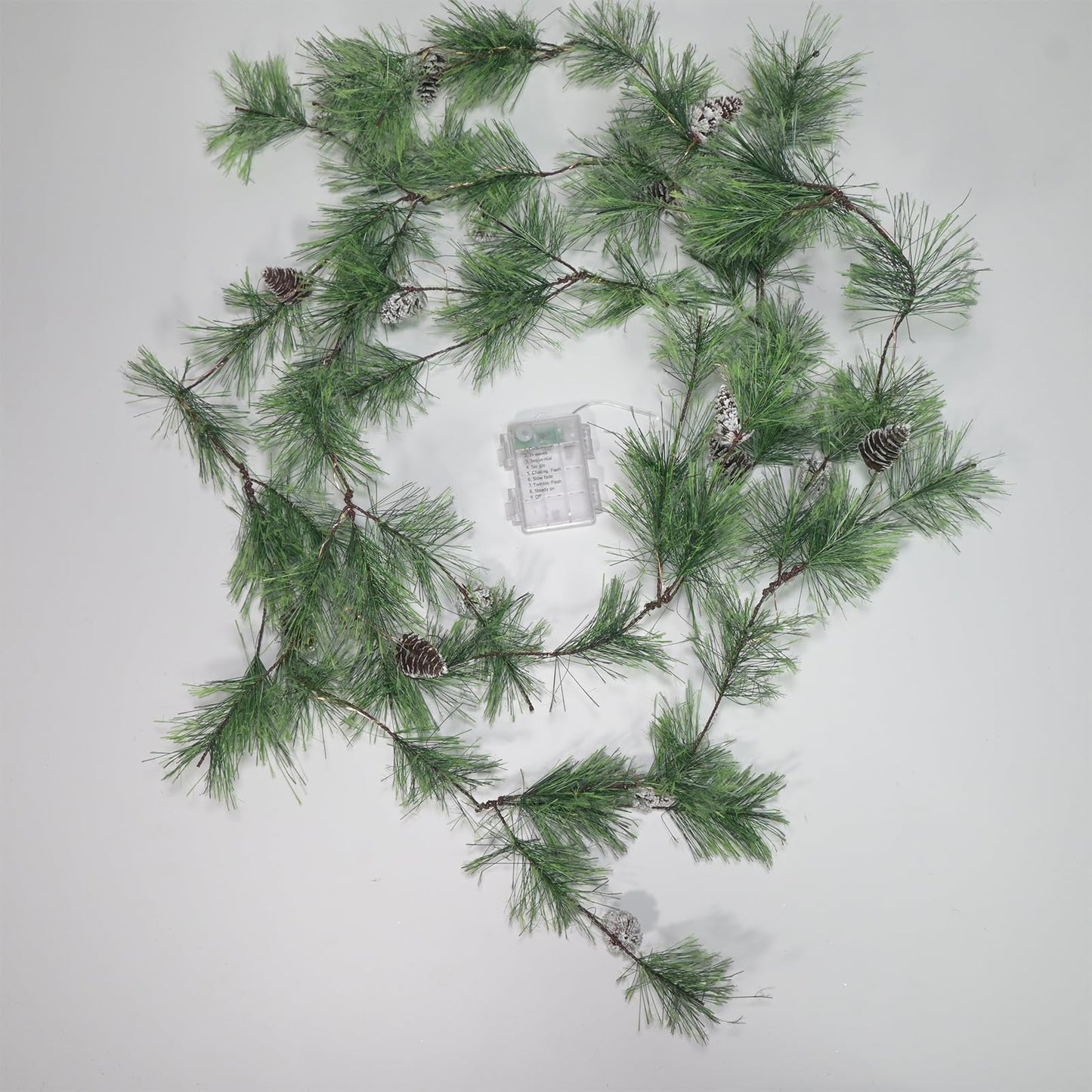 Pre-lit Christmas Garland with Lights 9.84 FT Smokey Pine Garlands 40 LED Fairy Lights Battery Operated with Timer Pine Cones Artificial Greenery Garland Wreath for Christmas Home Mantle Stairs Decor