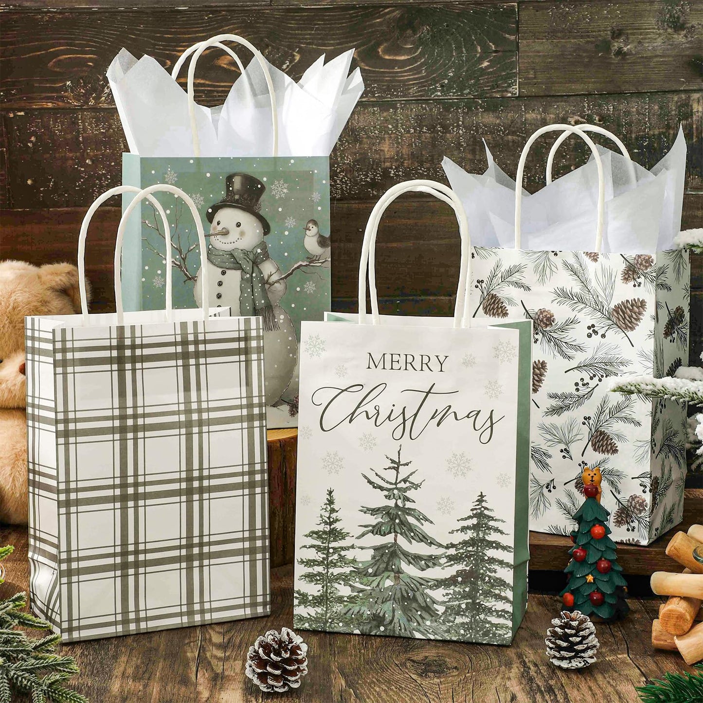 JarThenaAMCS 24 Pcs Christmas Paper Gift Bags with Tissue Paper Sage Green Xmas Tree Snowman Party Favor Large Bags with Handle Goodie Candy Treat Bags for Winter Wedding Holiday