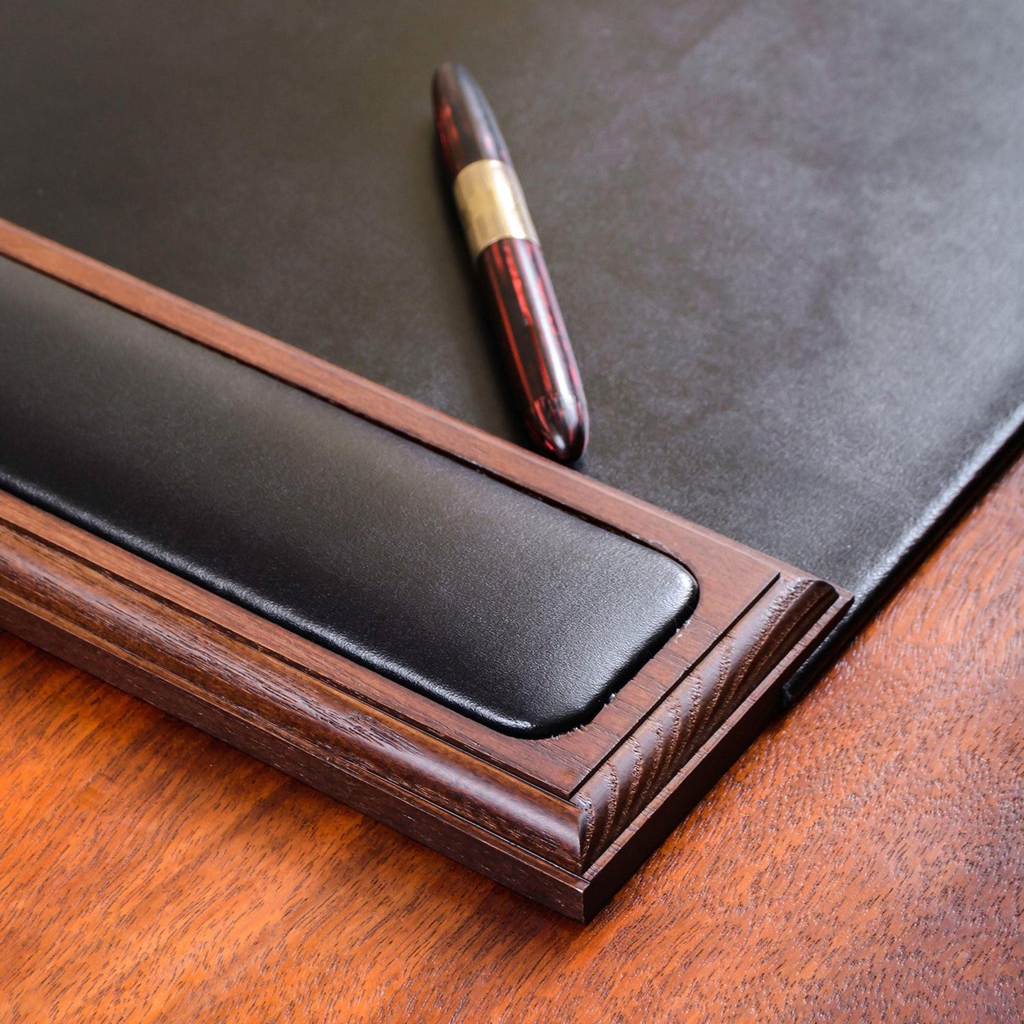 DACASSO Wood & Leather Desk Pad with Side Rails - Luxury Leather Desk Blotter for Writing - Padded Executive Desk Surface Protector - (Walnut & Black, 34” x 20”)