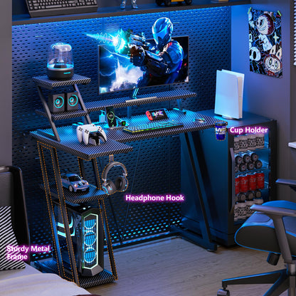 Korfile 40 Inch Gaming Desk with LED Lights & Power Outlet, Small Gaming Computer Desk with Storage Shelves, L Shaped Gamer Workstations with Monitor Stand for Bedroom, Carbon Fiber Black