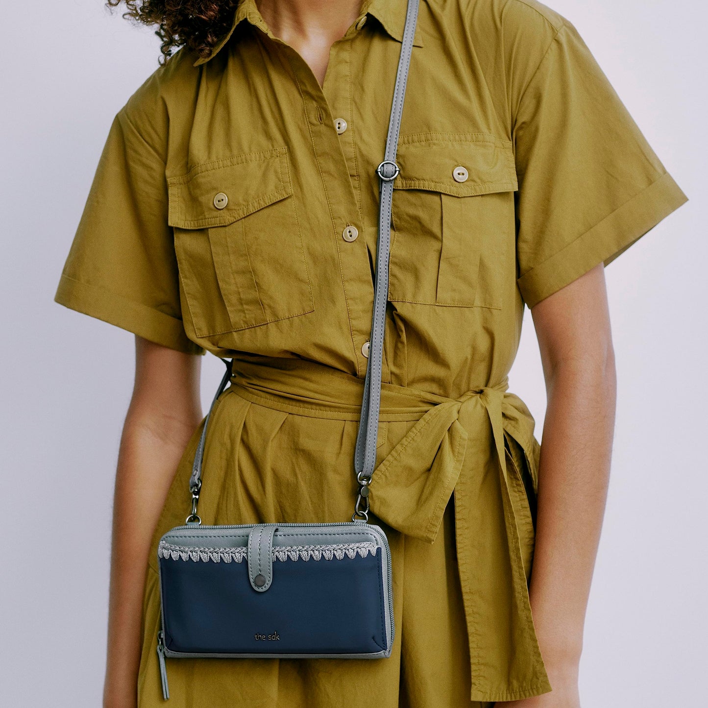 The Sak Iris Smartphone Crossbody Purse - Women's Cellphone Bag & Wallet For Everyday - Convertible Wristlet With Zipper in Dusty Blue Block/Leather