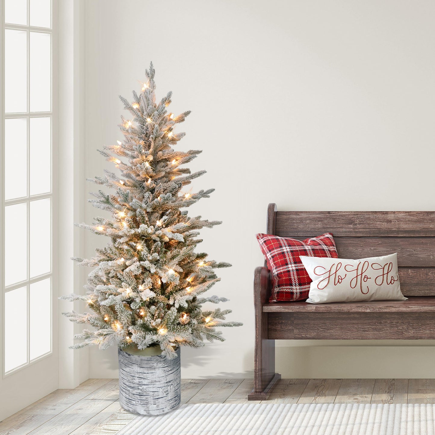 Puleo International 4.5ft Pre-Lit Potted Flocked Arctic Fir Christmas Tree with 70 Clear Lights, 419 Realistic Dense Snow Flocked Branch Tips, Easy Setup Artificial Trees with Sturdy Stand