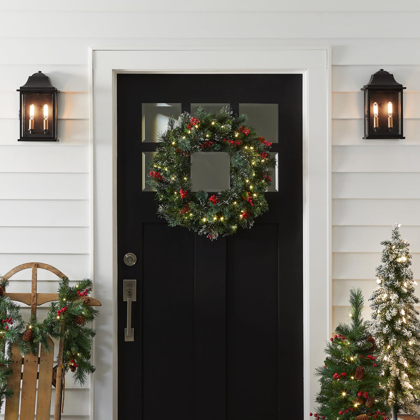 National Tree Company 24 in Pre-Lit Wintry Pine Flocked Artificial Christmas Wreath, Christmas Decoration with Pinecones, Red Berries, 50 Clear LED Lights, 113 Tips, Timer, Green