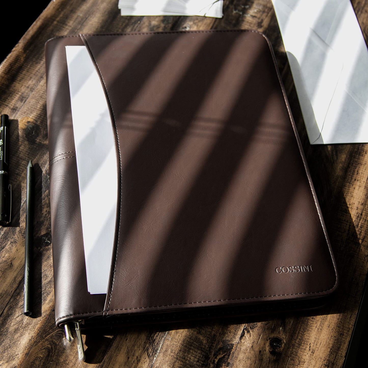 Cossini Premium Business Portfolio with Zipper – Padfolio - Superior Business Impressions Begin with PU Vegan Leather, 10.1 Inch Tablet Sleeve, Smart Storage, Solar Calculator, Writing Pad -Brown