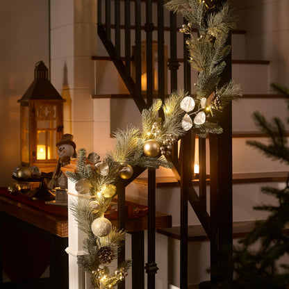 Valery Madelyn 6 Ft Pre-Lit Christmas Garland with Lights for Mantle, Lighted Outdoor Xmas Garland with White Gold Balls Norfolk Pine for Home Stairs Fireplace Table Centerpiece Indoor Holiday Decor