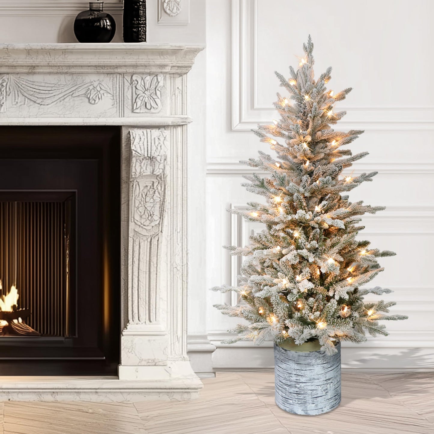 Puleo International 4.5ft Pre-Lit Potted Flocked Arctic Fir Christmas Tree with 70 Clear Lights, 419 Realistic Dense Snow Flocked Branch Tips, Easy Setup Artificial Trees with Sturdy Stand
